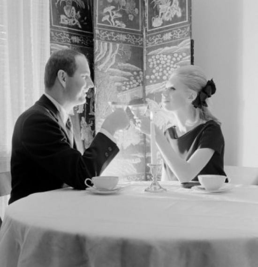 Mid adult couple having dinner in restaurant Canvas Art - (18 x 24)