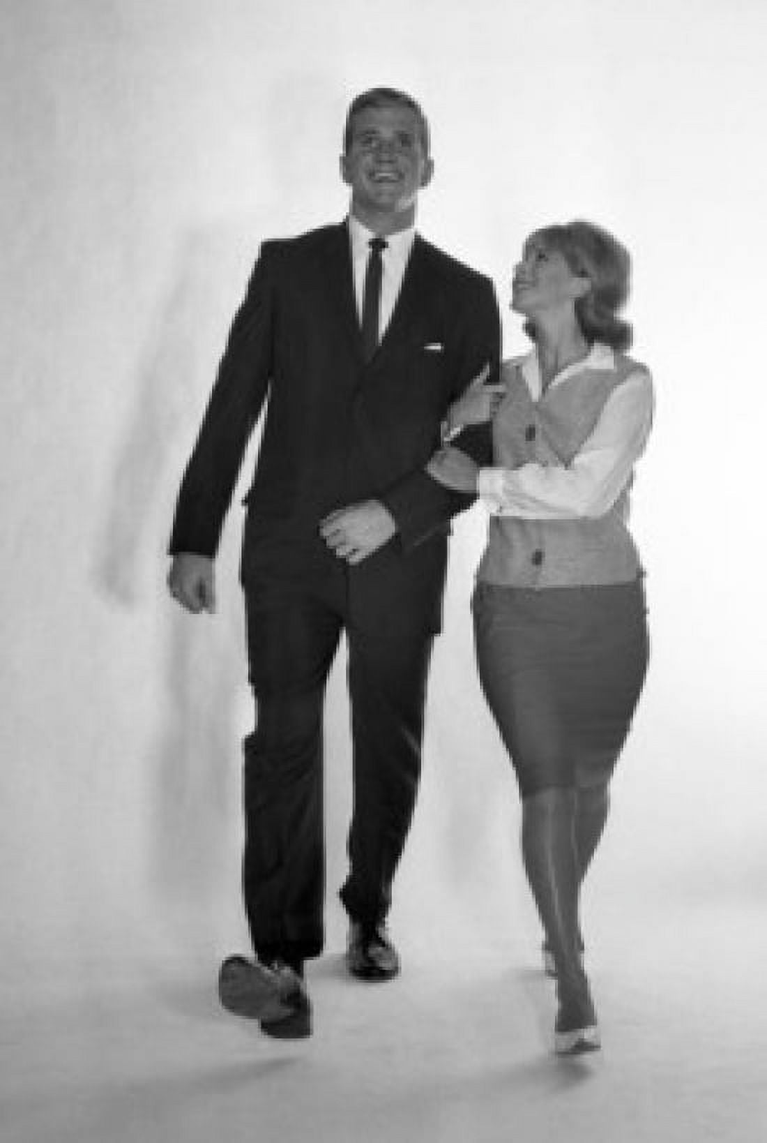 Mid adult couple marching Canvas Art - (18 x 24)