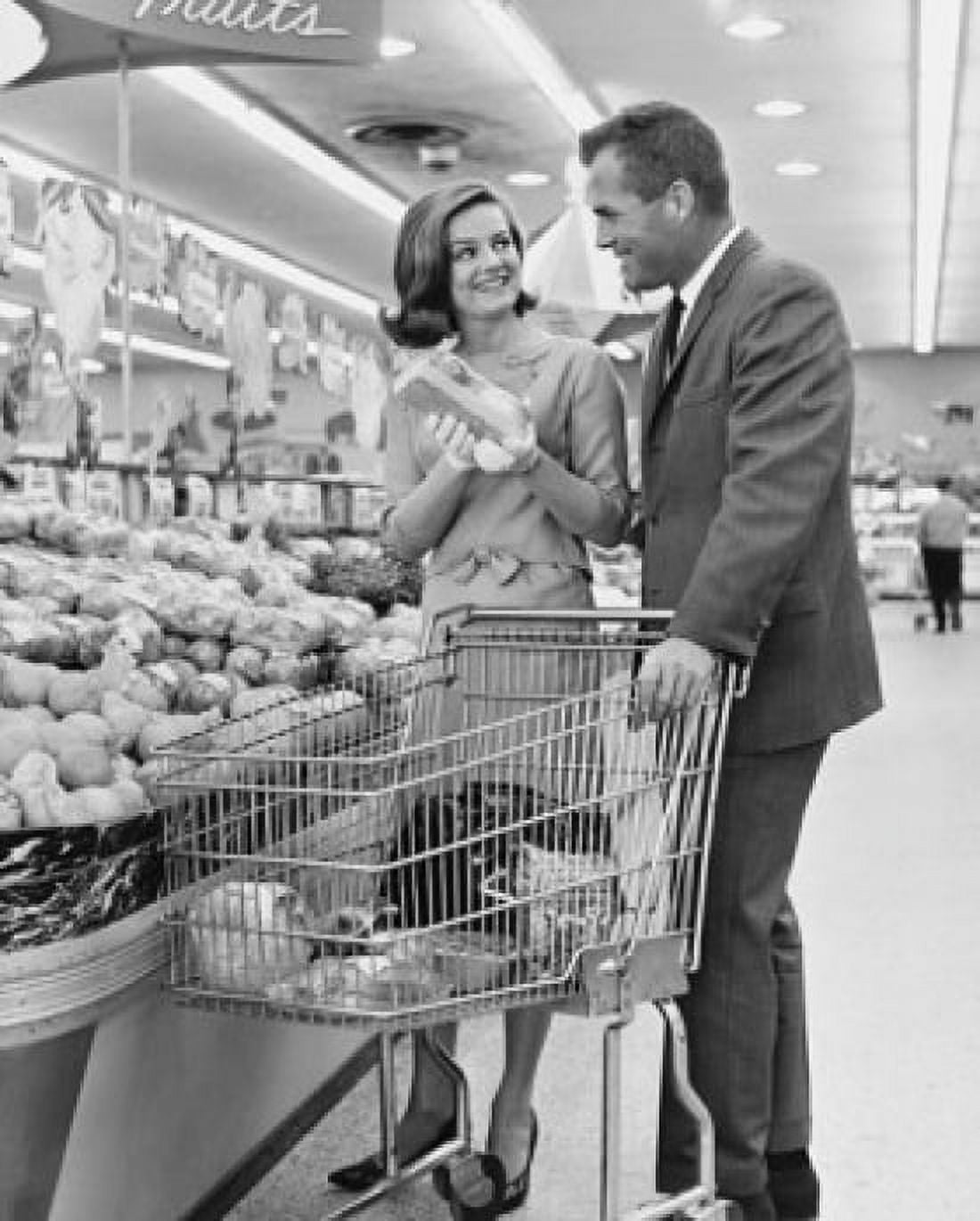 Mid adult couple shopping in a supermarket Canvas Art - (18 x 24)