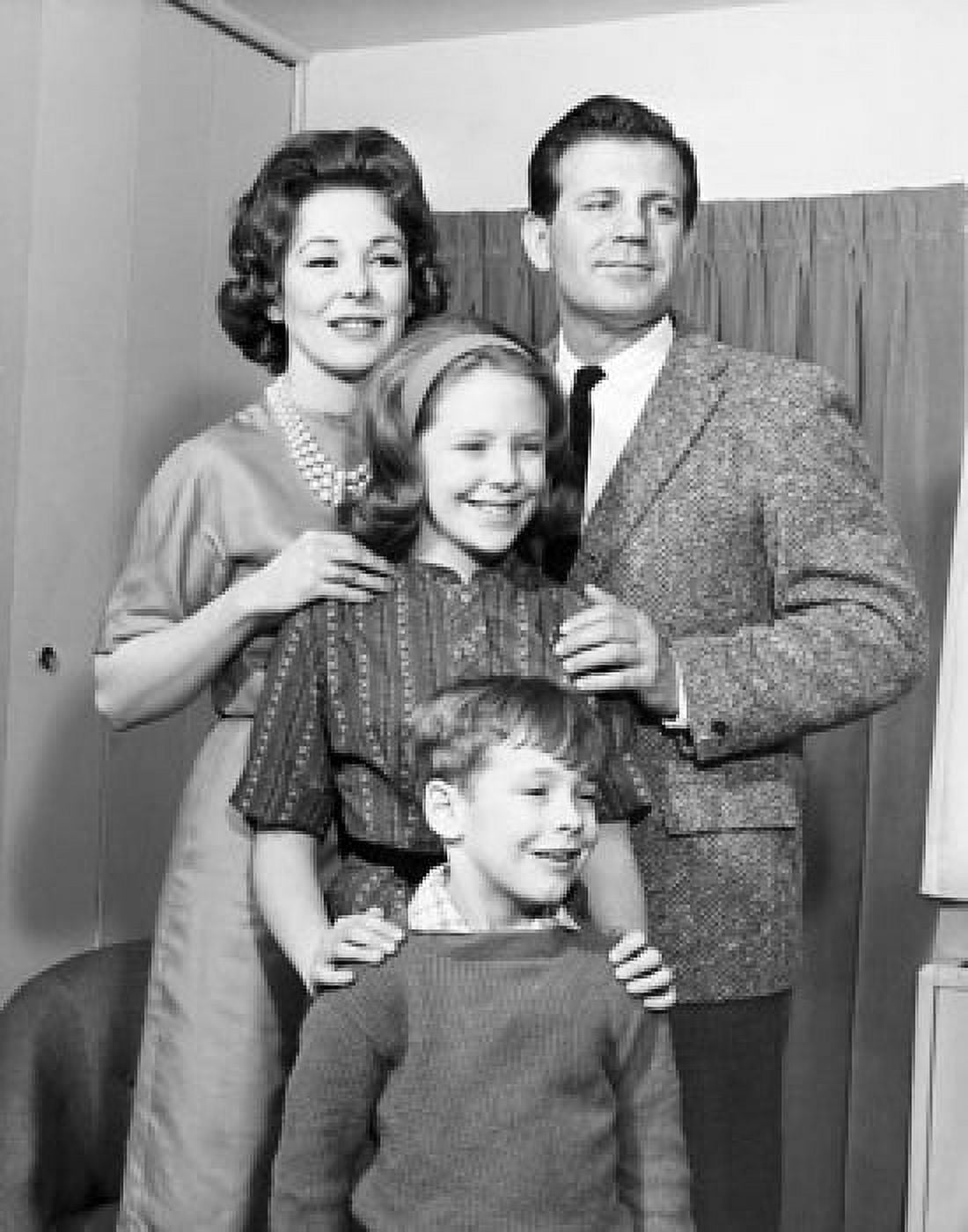 Mid adult couple with their children smiling Canvas Art - (24 x 36)
