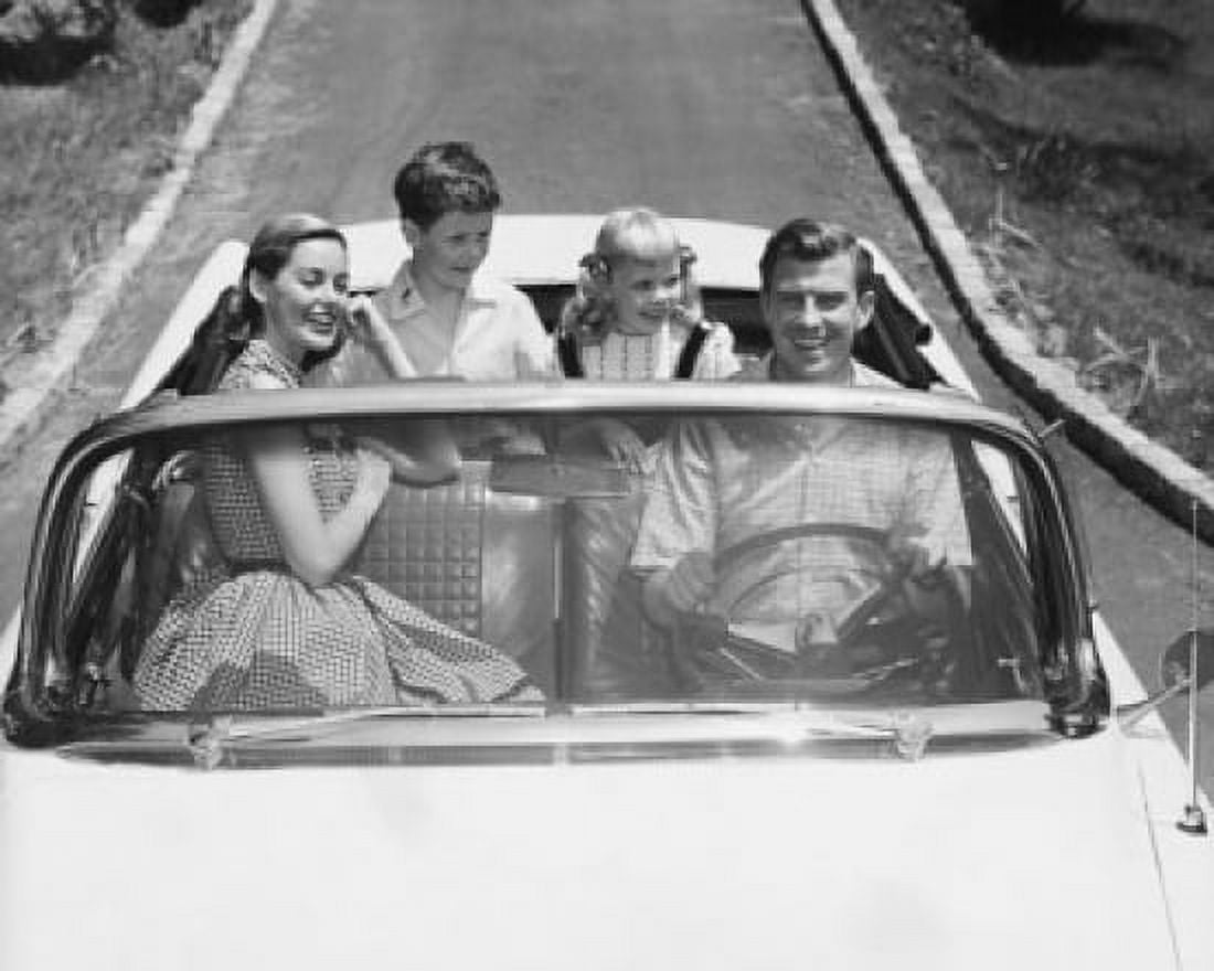 Mid adult couple with their children traveling in a car Canvas Art - (24 x 36)