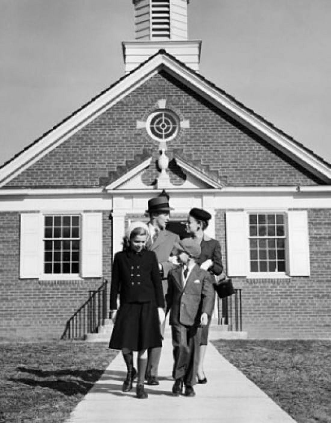 Mid adult couple with their two children walking out from a church Canvas Art - (18 x 24)