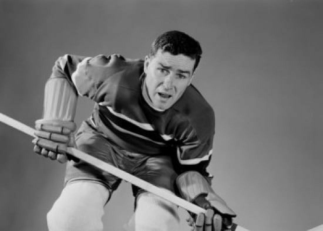 Mid adult ice hockey player Canvas Art - (24 x 36)