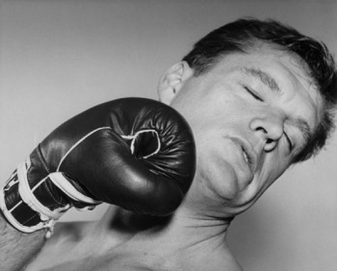 Mid adult man being hit by a punch Canvas Art - (24 x 36)