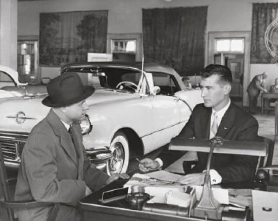 Mid adult man buying a car from a salesperson Canvas Art - (24 x 36)