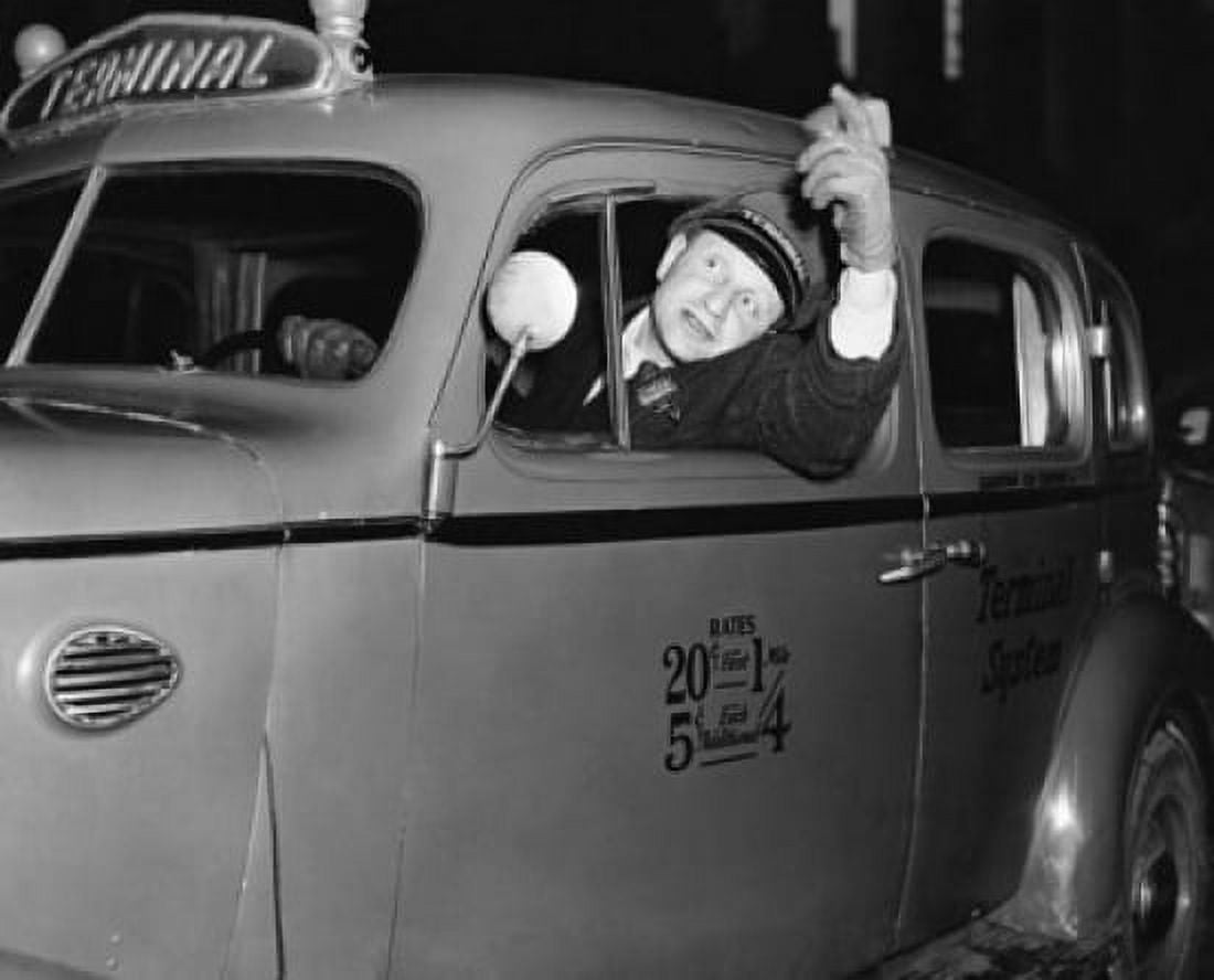 Mid adult man driving a car Canvas Art - (18 x 24)