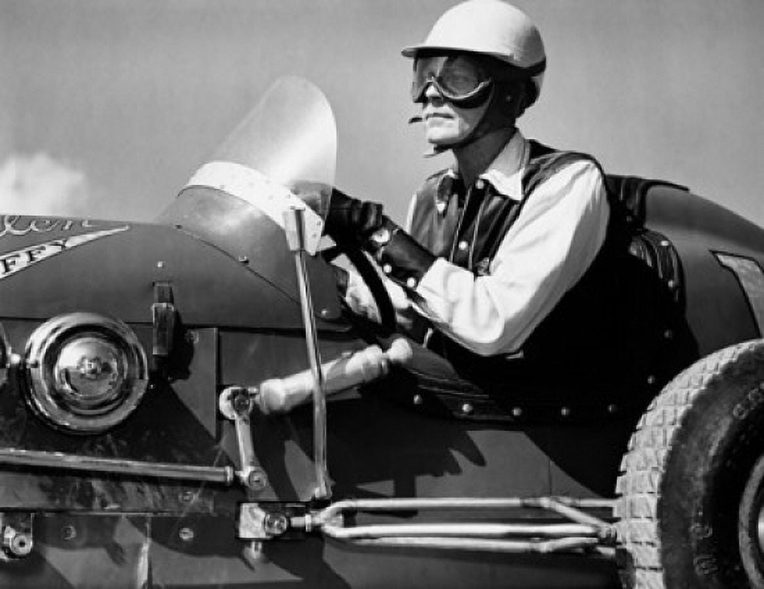 Mid adult man driving race car Canvas Art - (24 x 36)