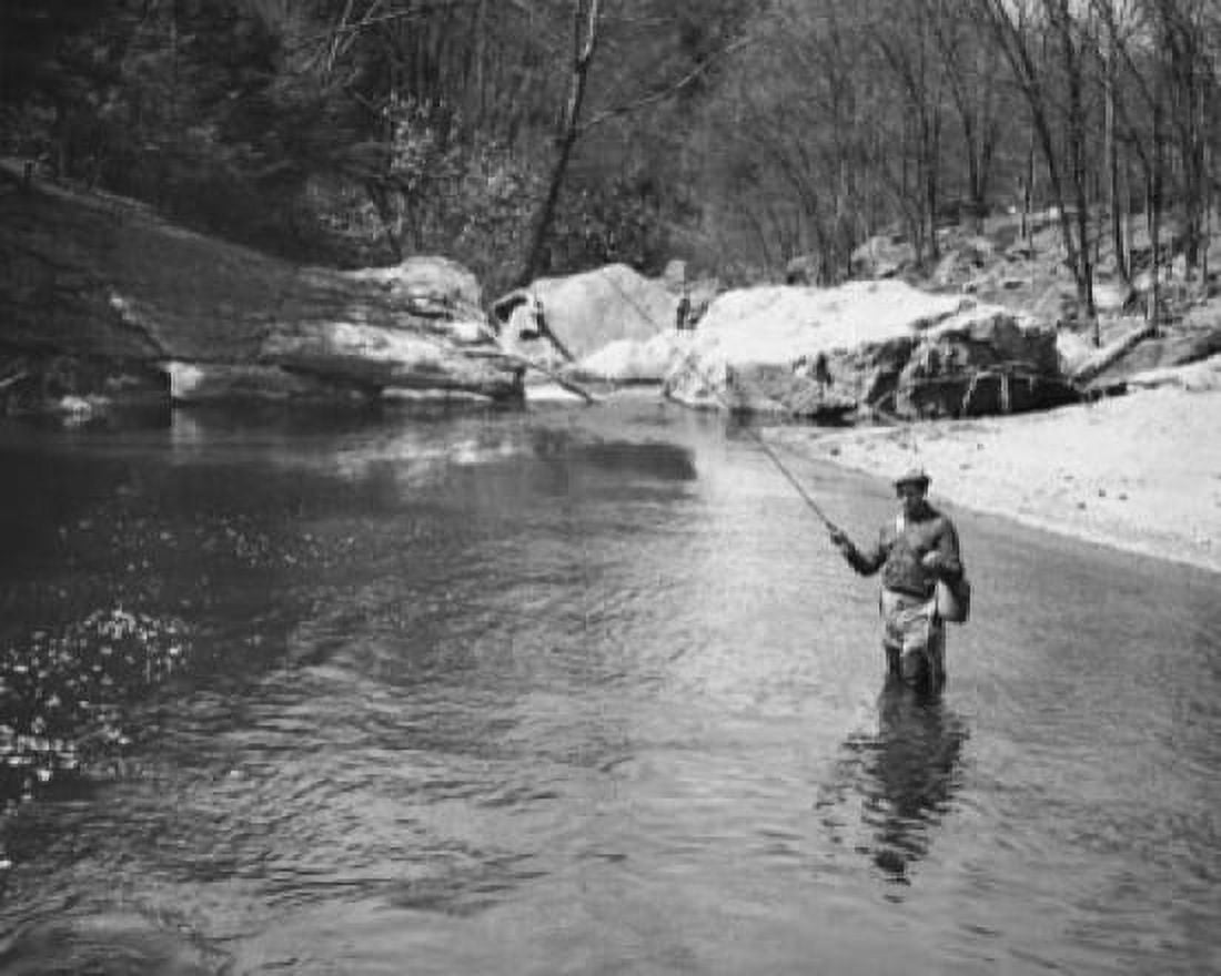 Mid adult man fly-fishing in a lake Canvas Art - (24 x 36)