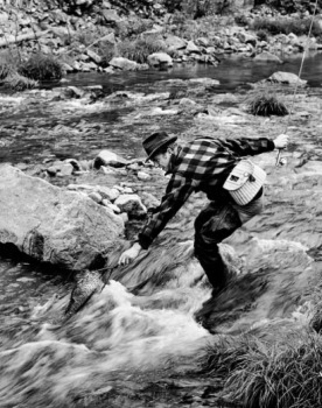 Mid adult man fly fishing in a stream Canvas Art - (18 x 24)