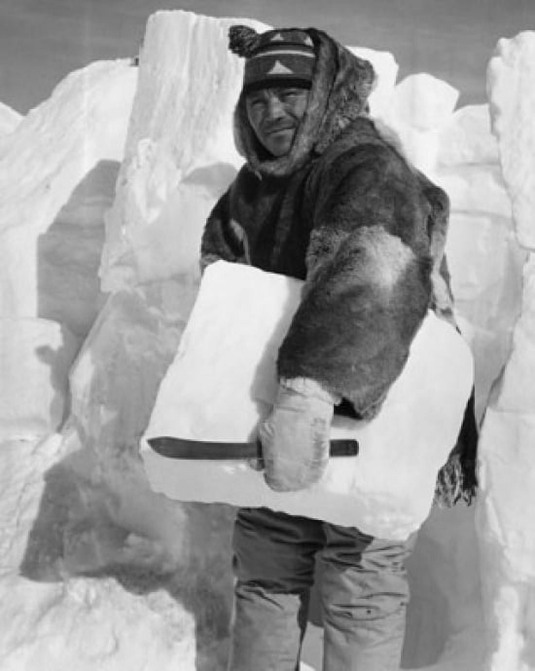 Mid adult man holding a block of ice Canvas Art - (18 x 24)