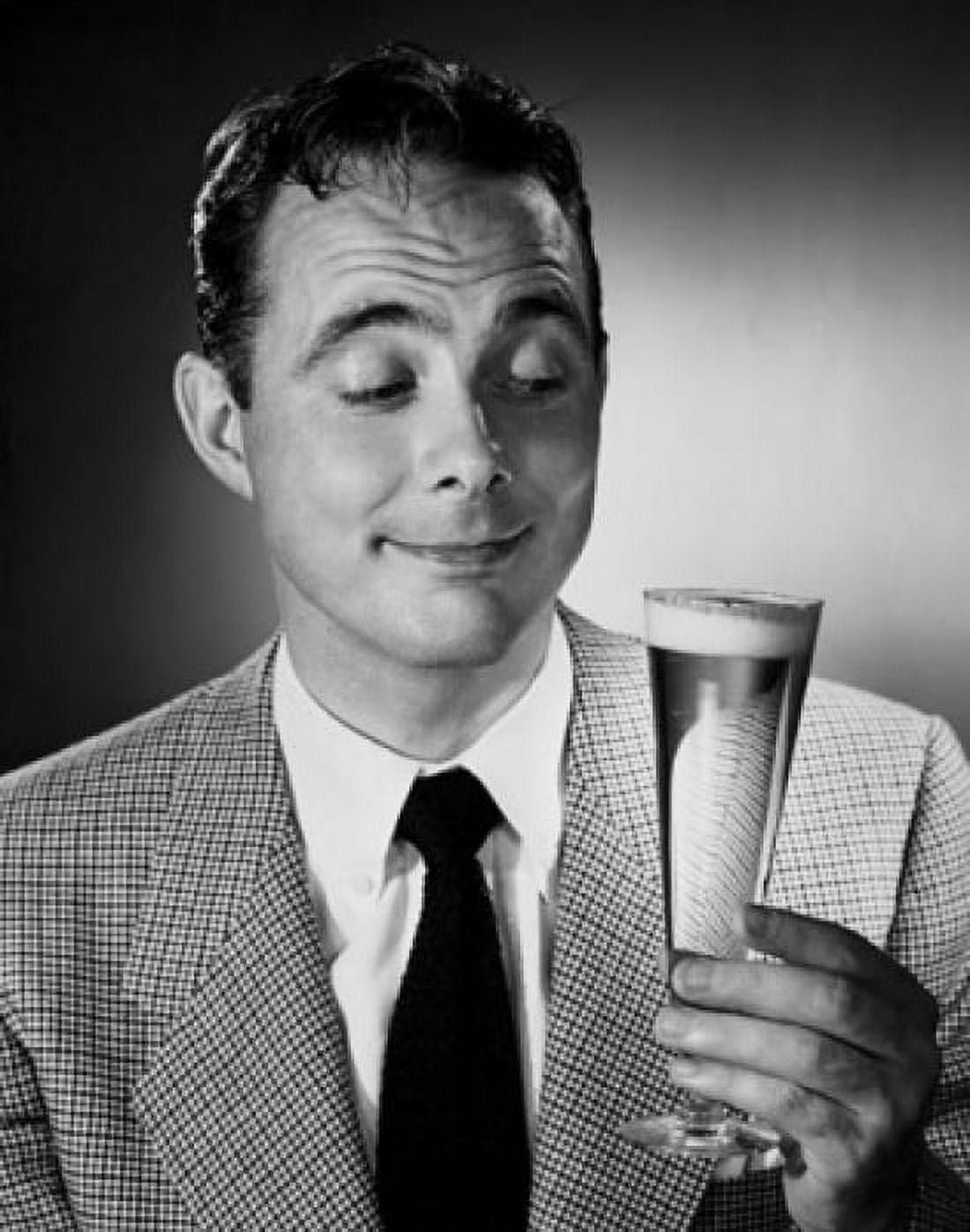 Mid adult man holding glass of beer Canvas Art - (18 x 24)