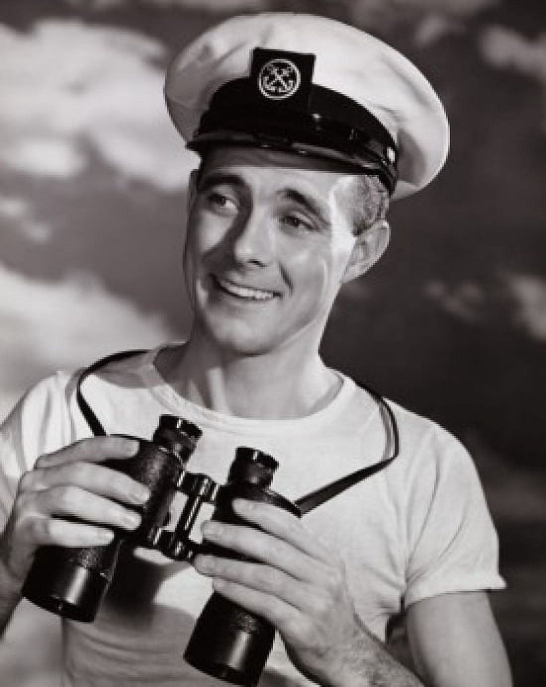 Mid adult man holding pair of binoculars and smiling Canvas Art - (18 x 24)