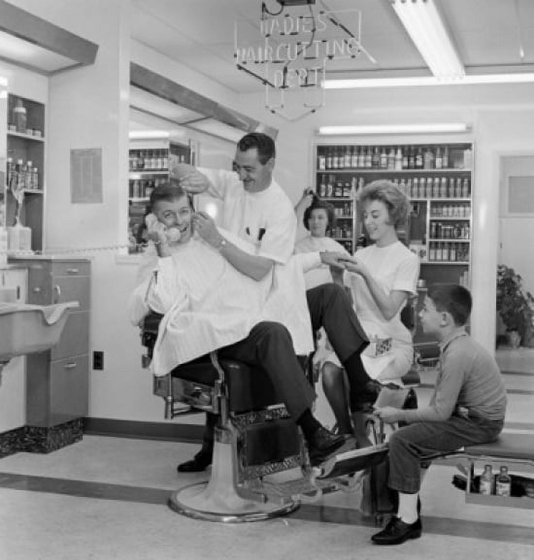 Mid adult man receiving treatment in a hair salon Canvas Art - (18 x 24)