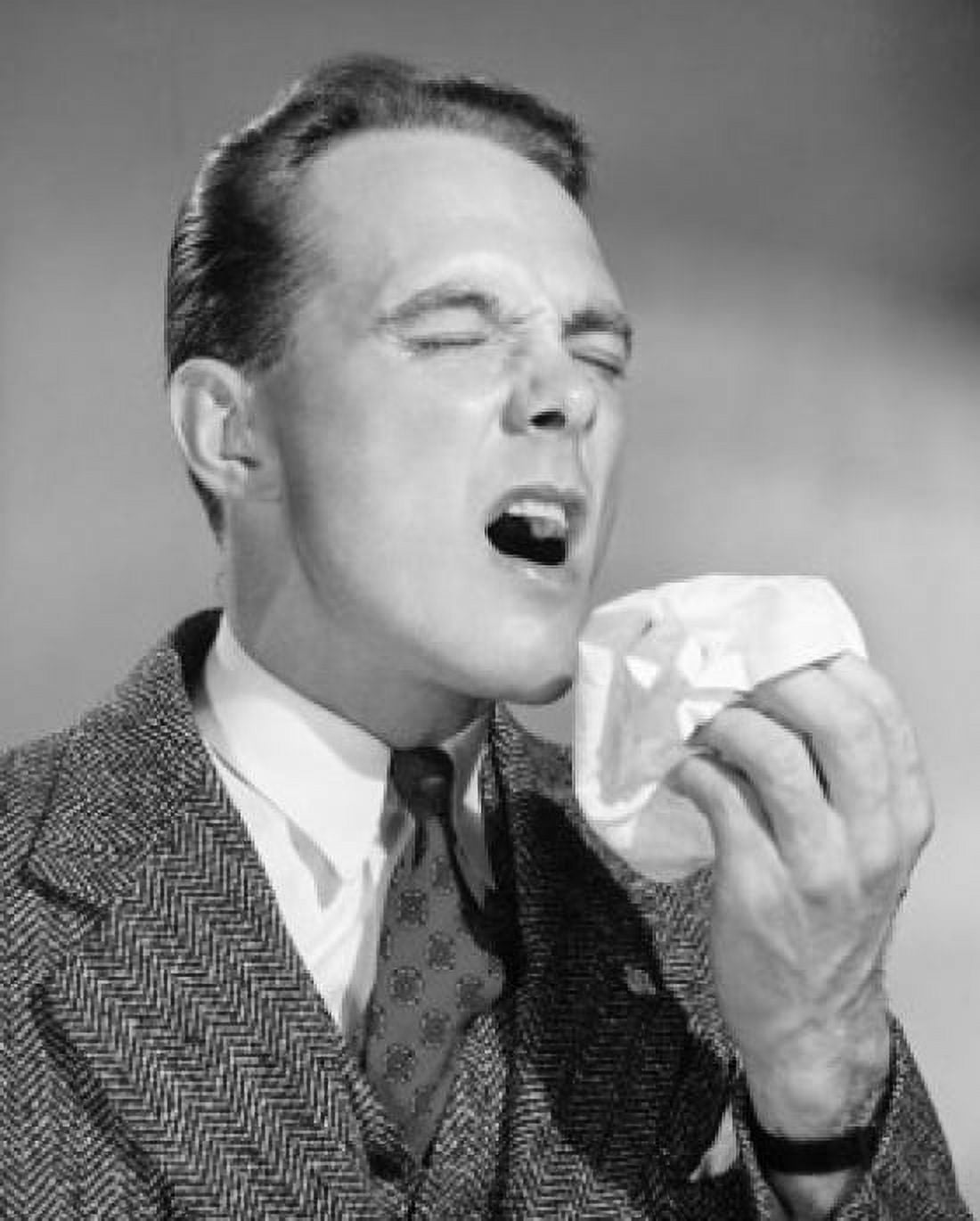Mid adult man sneezing Canvas Art - (18 x 24)