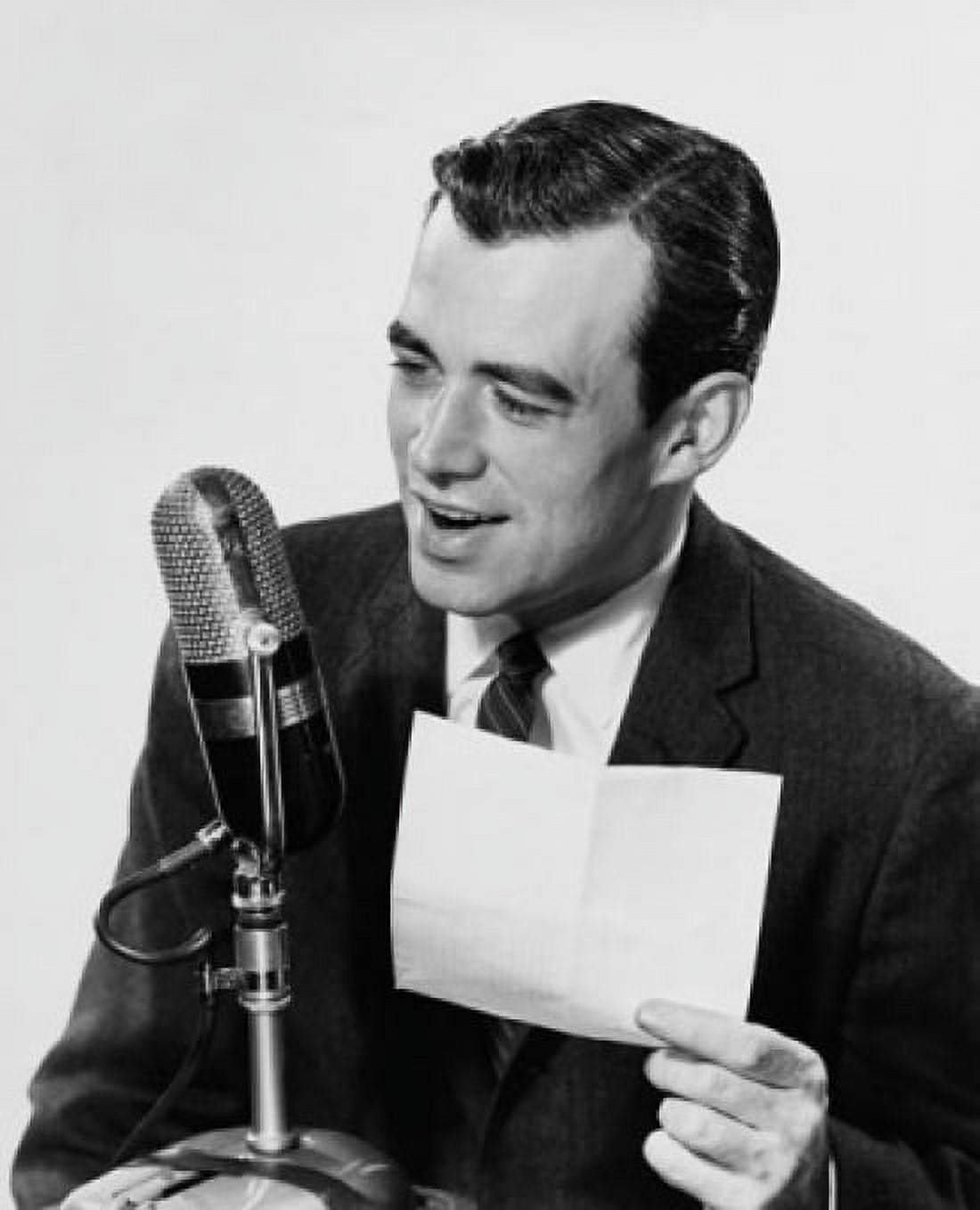 Mid adult man speaking into a microphone Canvas Art - (24 x 36)
