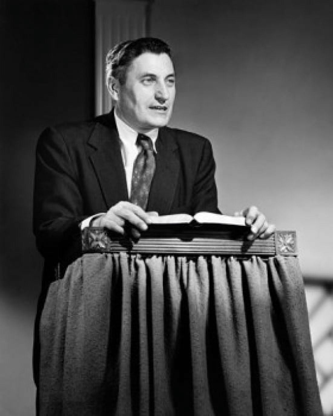 Mid adult man standing at a lectern and talking Canvas Art - (18 x 24)