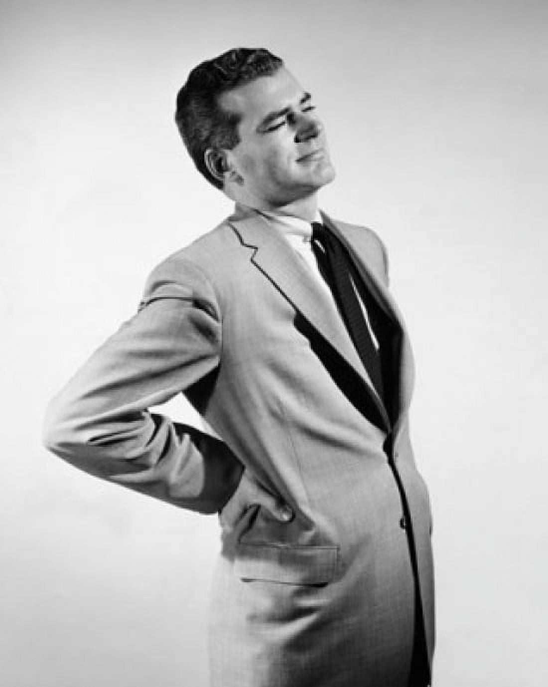 Mid adult man suffering from a backache Canvas Art - (24 x 36)