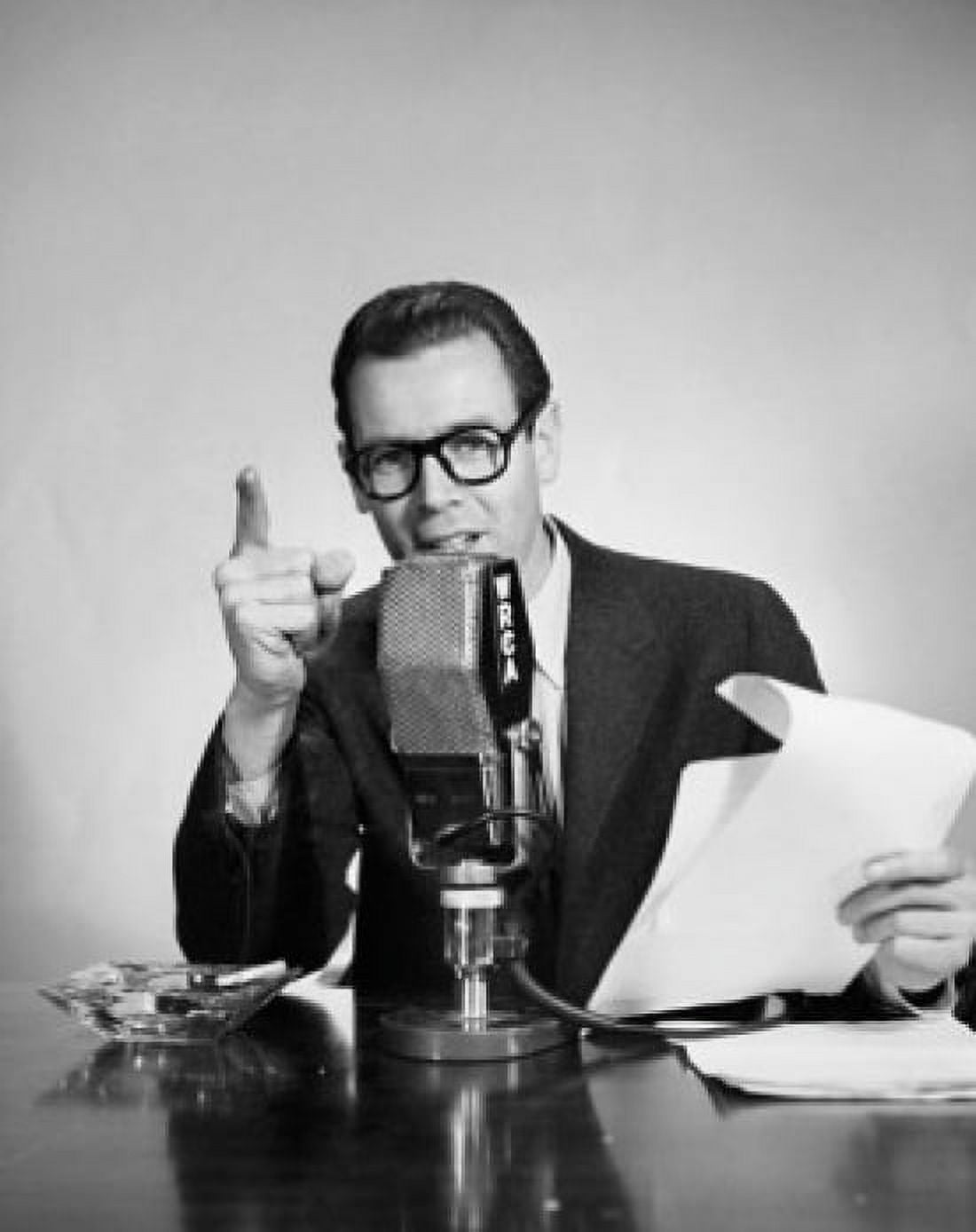 Mid adult man talking on a microphone Canvas Art - (24 x 36)
