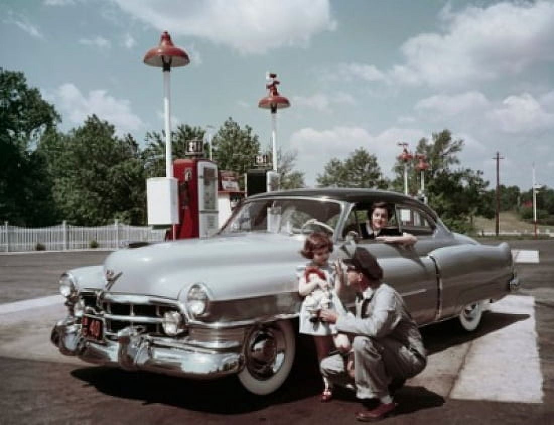 Mid adult man talking to his daughter and a mid adult woman sitting in a car Canvas Art - (18 x 24)