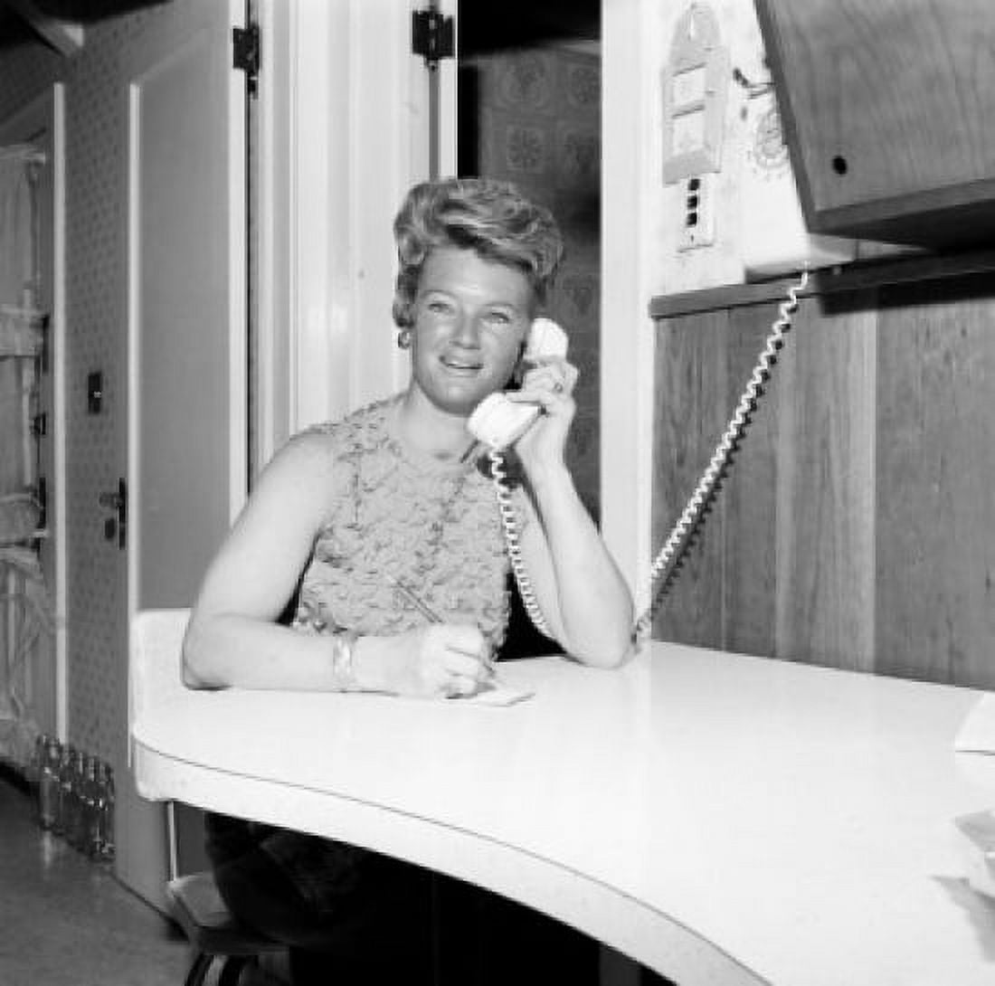 Mid adult office worker using telephone Canvas Art - (18 x 24)