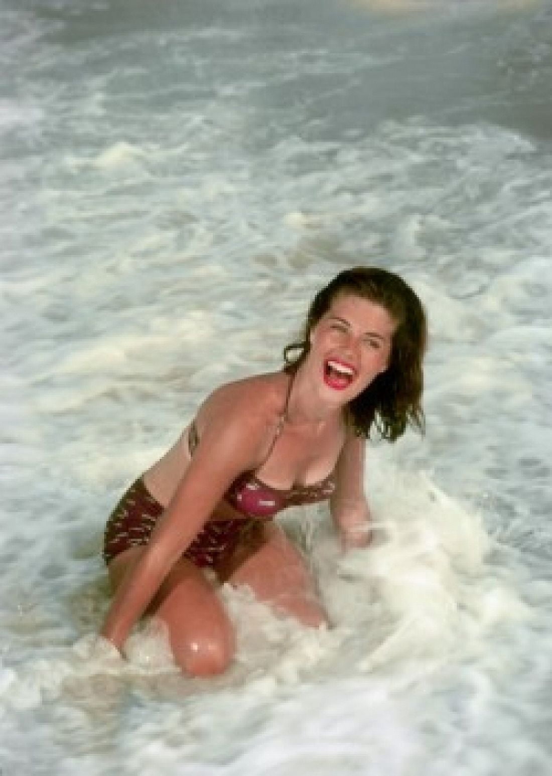 Mid adult woman bathing in sea Canvas Art - (24 x 36)