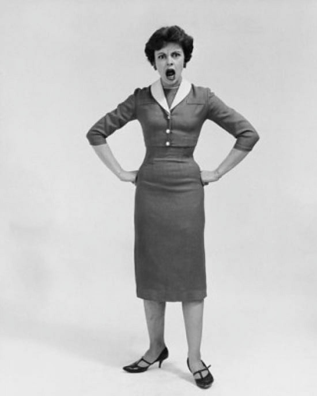 Mid adult woman standing with arms akimbo and shouting Canvas Art - (24 x 36)