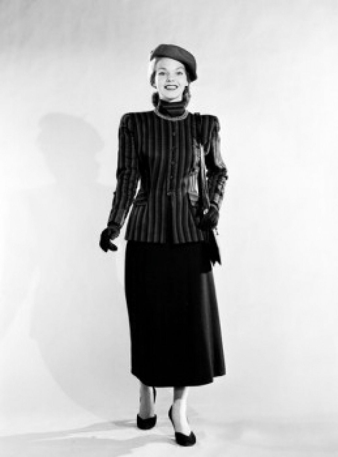 Mid adult woman wearing skirt jacket and hat Canvas Art -  (18 x 24)