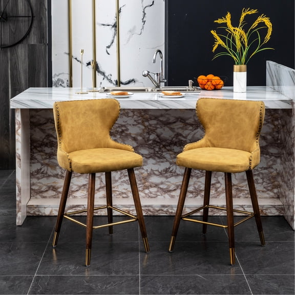 Mid-century inspired yellow counter stool set with curved seat and wood legs for home dining areas gives a warm look
