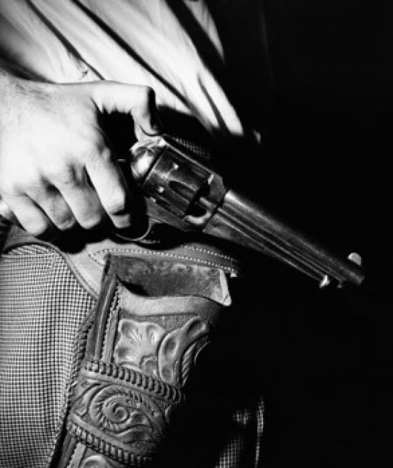 Mid section view of a man holding a revolver Canvas Art - (18 x 24)