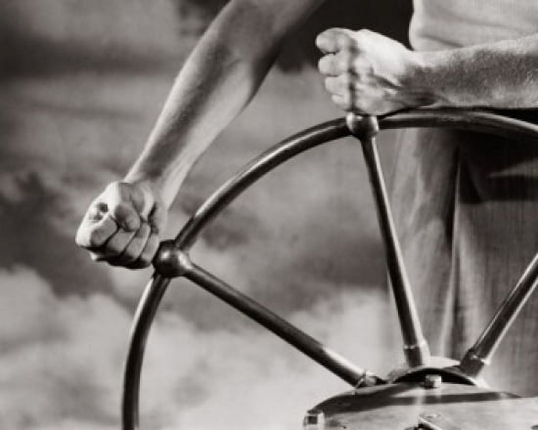 Mid section view of a man operating the helm of a boat Canvas Art - (24 x 36)
