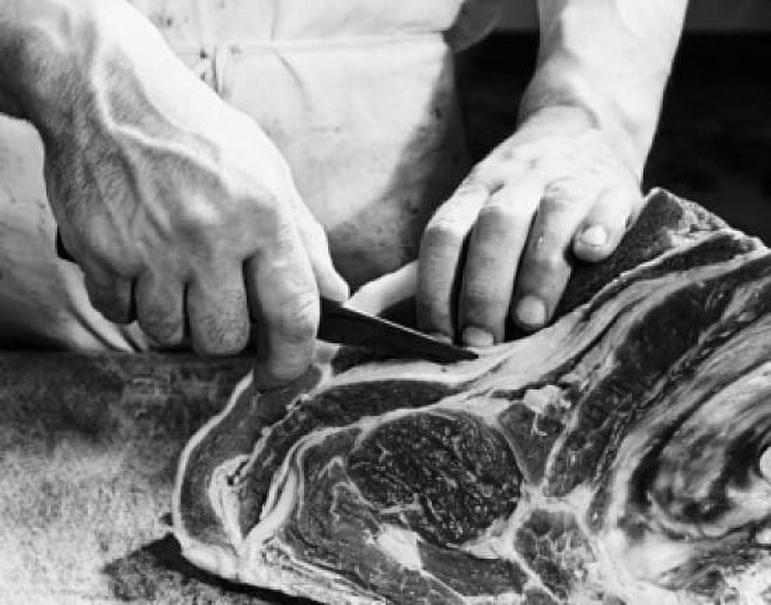 Mid section view of a mans hands cutting raw meat Canvas Art - (24 x 36)