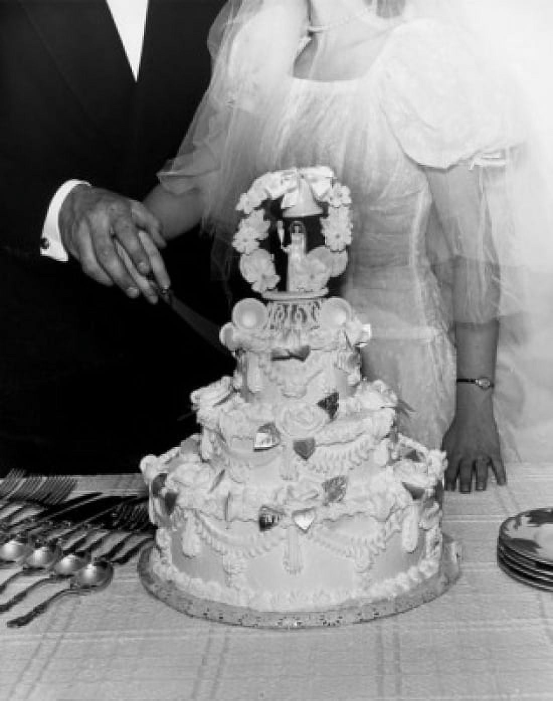 Mid section view of a newlywed couple cutting a wedding cake Canvas Art - (24 x 36)