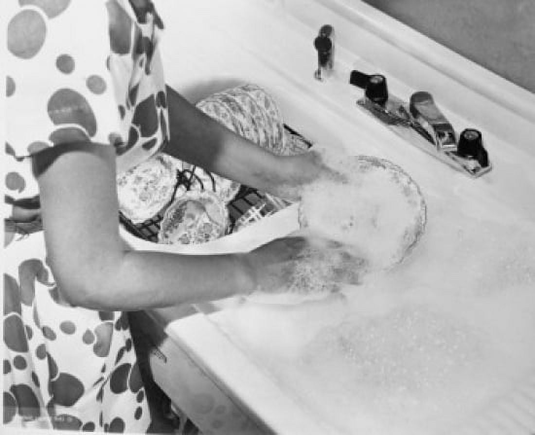 Mid section view of a young woman washing dishes Canvas Art - (18 x 24)