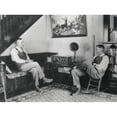 thumbnail image 1 of Middle Aged Farmer And His Adult Son Listening To The Radio In Their Comfortable Home History, 1 of 1