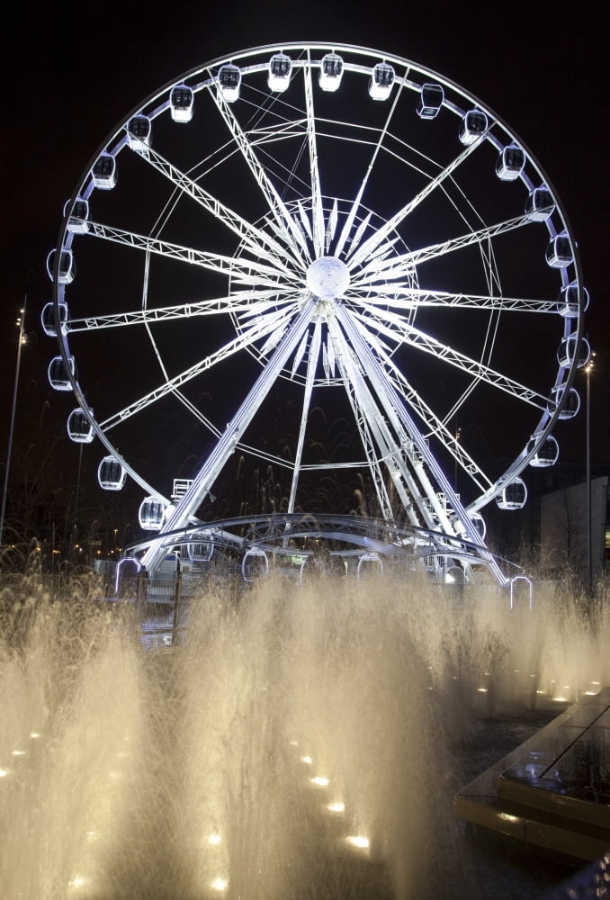 Middlesbrough North Yorkshire England A Ferris Wheel And Fountains Illuminated At Night Canvas Art - John Short Design Pics (12 x 18)