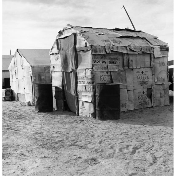 Migrant Farmer Camp 1938. Ncamp Of Cardboard Houses Inhabited By Migrant Farmers In America. Photograph 1938. Print by