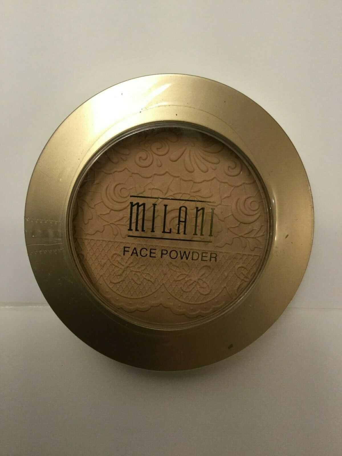 Milani The Multitasker Face Powder # 05 Tan NEW AND SEALED.