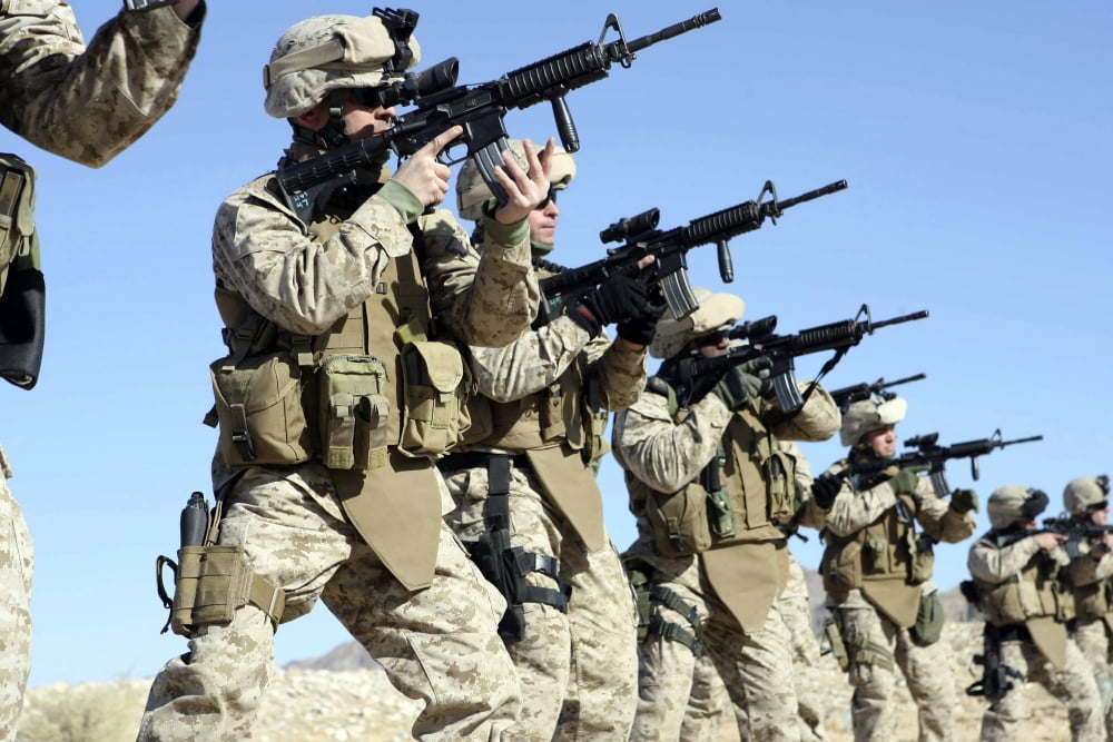 Military Transistion Team members quickly reload their rifles Canvas Art - Stocktrek Images (34 x 23)