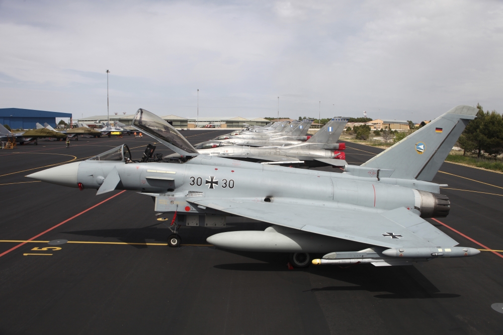 Military aircraft parked on the ramp at Albacete Airfield Spain Canvas Art - Timm ZiegenthalerStocktrek Images (35 x 23)