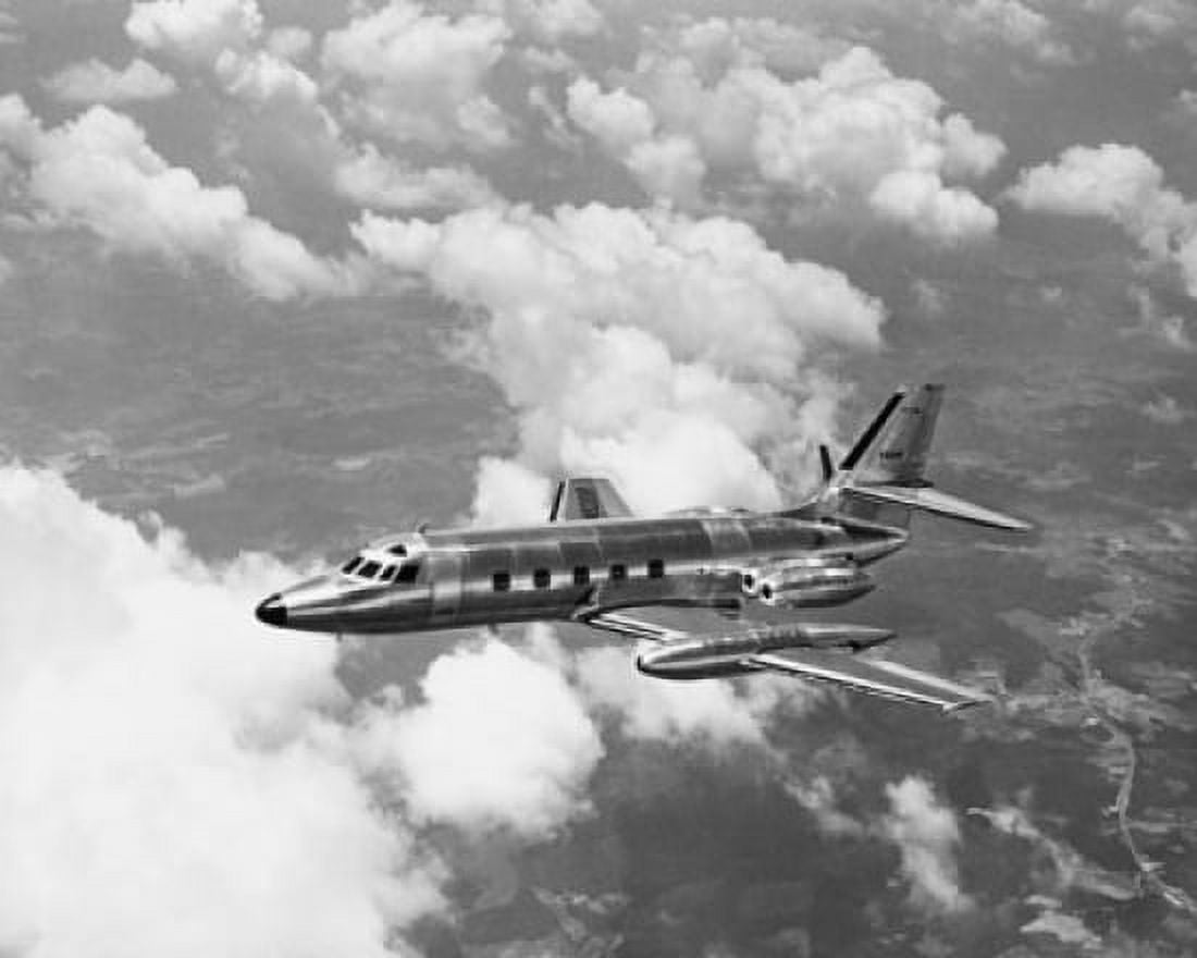 Military airplane in flight Canvas Art - (24 x 36)