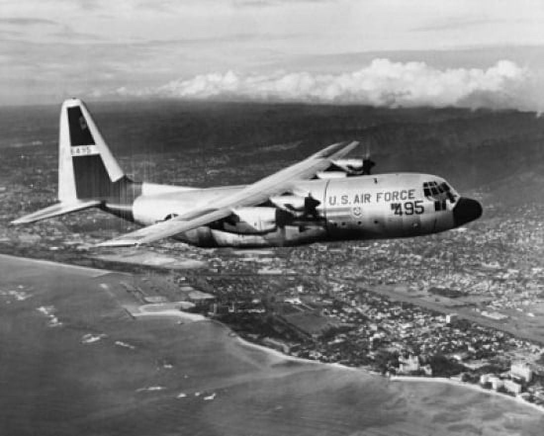 Military airplane in flight Waikiki Oahu Hawaii USA Canvas Art - (18 x 24)