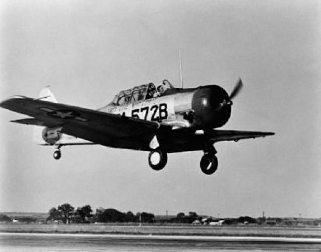 Military airplane landing on a runway Canvas Art - (24 x 36)