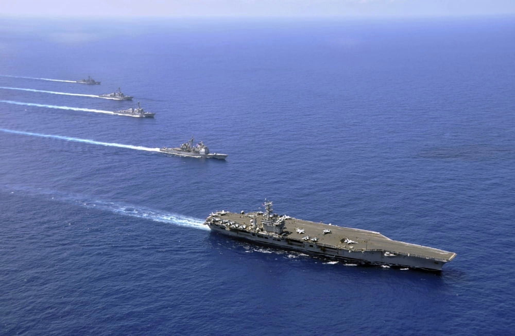 Military ships operate in formation in the South China Sea Canvas Art - Stocktrek Images (35 x 23)