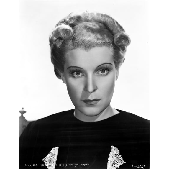 Miliza Korjus on a Dark Top and posed Photo Print (8 x 10)