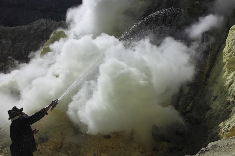 Miner cooling condensation pipes Kawah Ijen volcano Java Indonesia Canvas Art - Richard RoscoeStocktrek Images (18 x 12)