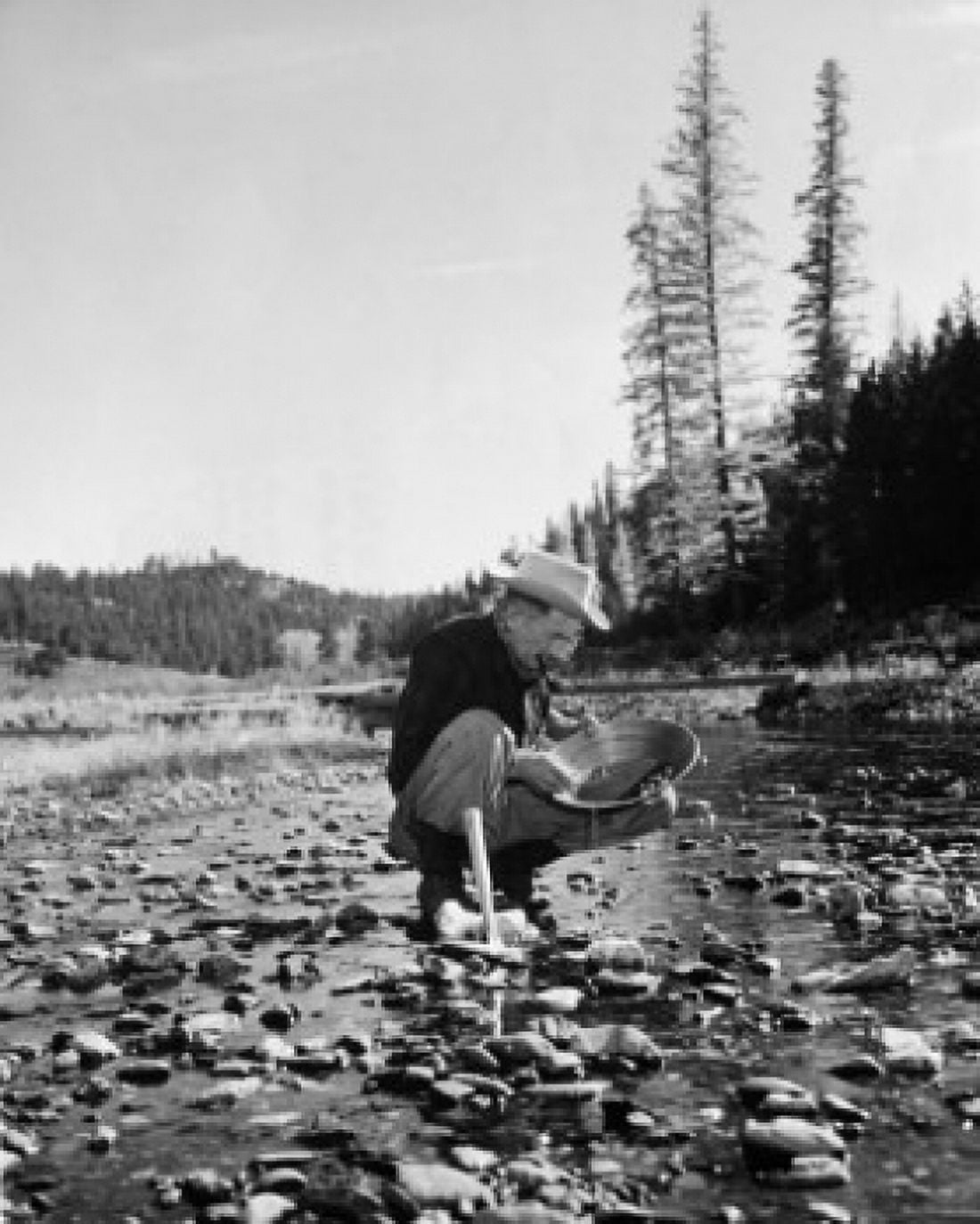 Miner panning for gold Canvas Art - (24 x 36)