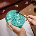 thumbnail image 1 of Mini 4-Inch 8-Tone Tongue Drum for Beginners, Carbon Steel Compact Hollow Drum, Portable Music Therapy Instrument for Kids, Students, and Adults, 1 of 6
