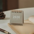 thumbnail image 1 of Taicans Mini Monthly Desk Calendar 2025-2026,15-Month Mini Desktop Standing Calendar from October 2025 to December 2026,Calendar with Twin-Wire Binding & Julian Dates,2.5x2.7inch, 1 of 5