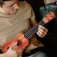 thumbnail image 1 of Mini Ukulele Guitar for Beginner 16" Classical Ukulele Guitar Musical Instrument Small Cute 4 Strings Guitar Ukulele Learning Toy for Birthday Christmas Party Favor, 1 of 8