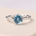 thumbnail image 1 of Minimalist Swiss blue topaz ring round shaped bamboo statement ring Novmeber birthstone, 1 of 5